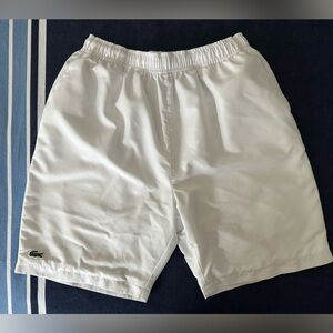 White Lacoste Youth lined shorts